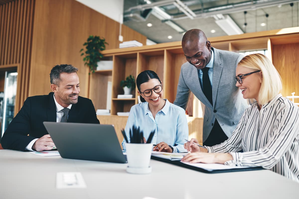 Team of business owners planning LLC formation strategy